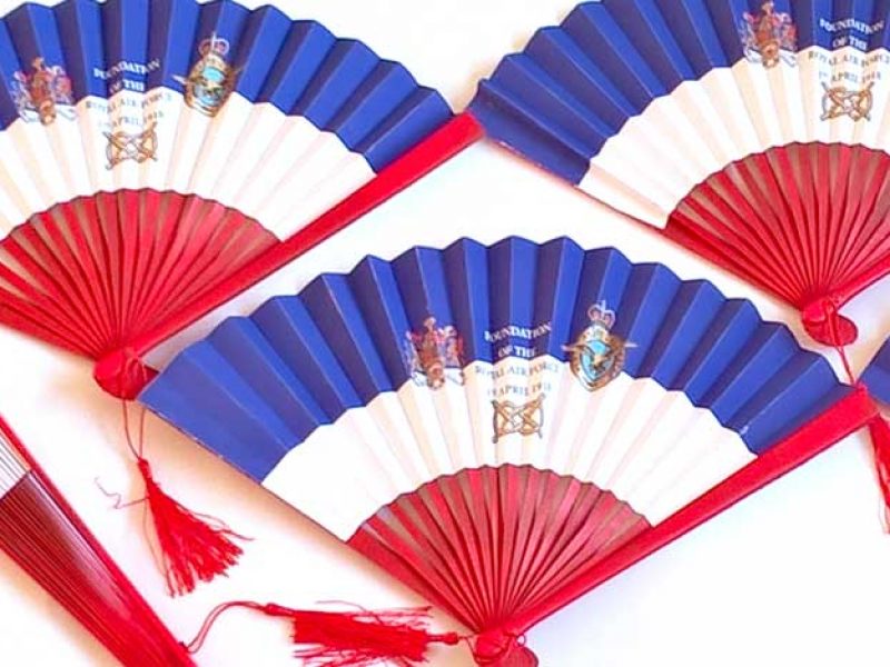 A series of fans with a navy motif